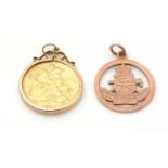 Gold sovereign pendant and Royal Artillery pendant