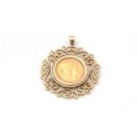 A George V 1914 gold half sovereign, in a 9ct gold pendant mount,