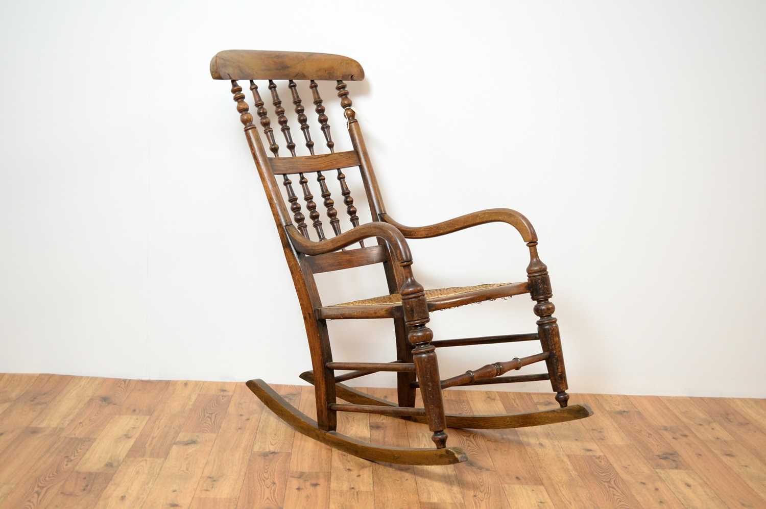 A 20th Century beech and elm rocking chair. - Image 2 of 7