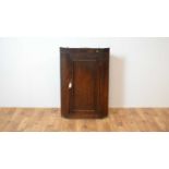 18th Century oak corner cupboard