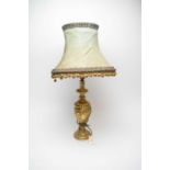 A vintage Venetian style gilt table lamp and shade.