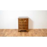 A 20th Century Regency Revival bowfront chest of drawers of small proportions