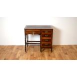 An early 20th Century mahogany writing desk of small proportions.