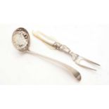 A Georgian silver ladle and a Victorian silver toasting fork