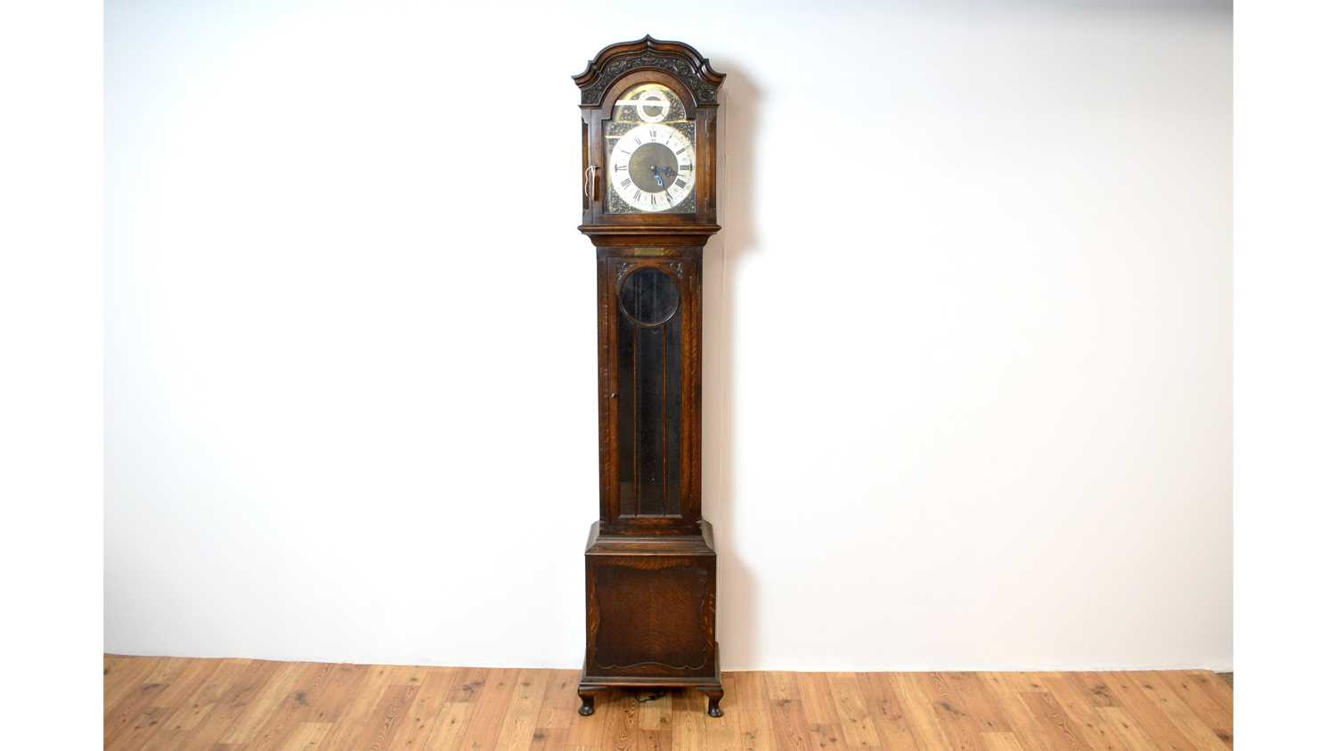 A 20th Century oak longcase / grandfather clock