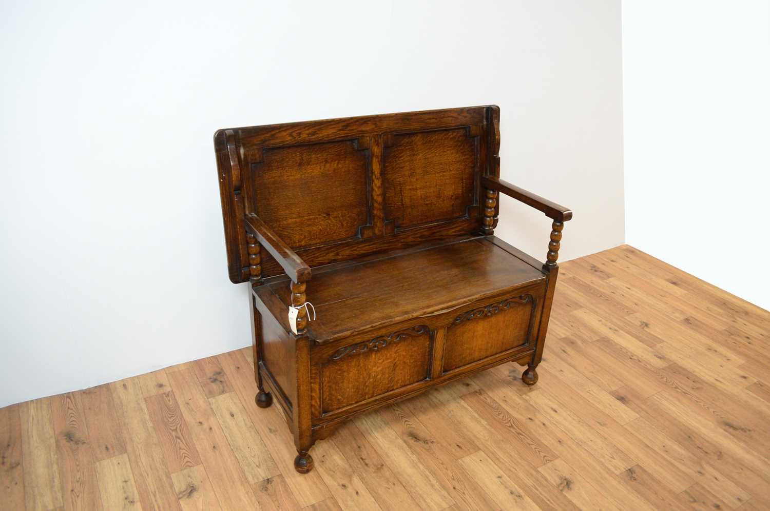 A 20th Century Jacobean Revival oak monks bench - Image 4 of 7