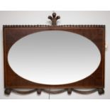 An early 20th Century hanging mirror in mahogany frame