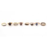 A selection of rings, set with diamonds and other stones,