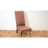 A 19th Century Victorian mahogany framed nursing chair