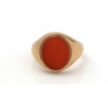 A carnelian and 9ct gold signet ring,
