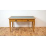 A vintage mid 20th Century oak writing desk