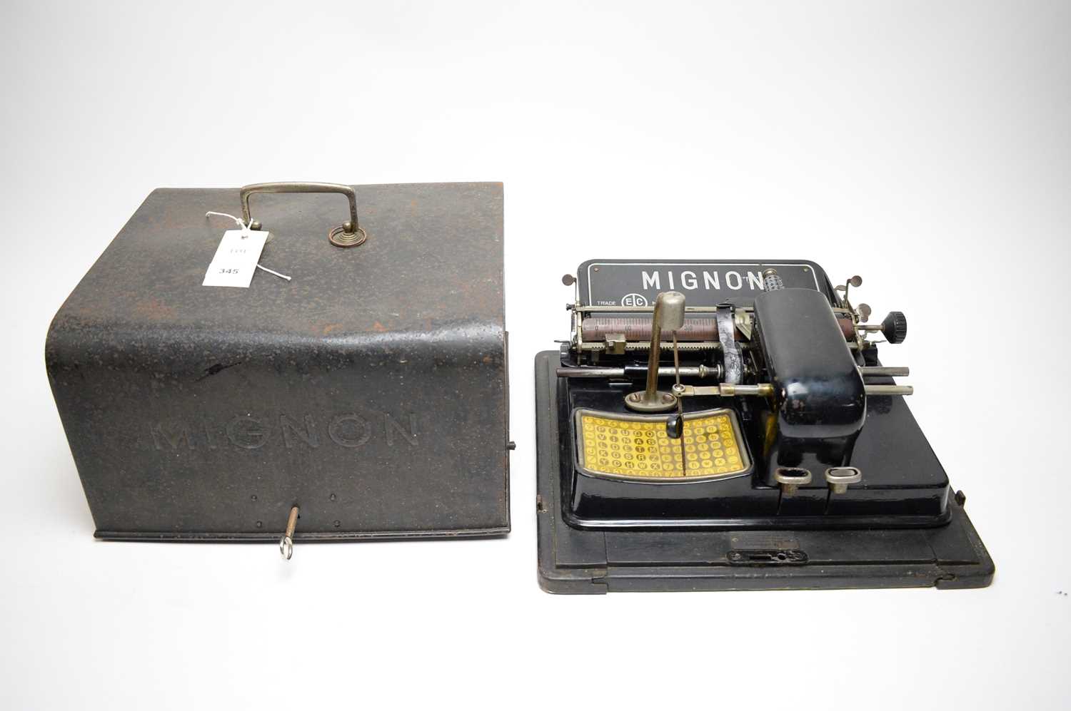 A Mignon index typewriter, by AEG Berlin, in cast metal case.