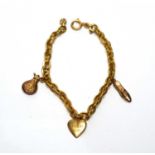 A yellow gold charm bracelet,