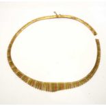 A 9ct yellow, white and rose gold fringe necklace,