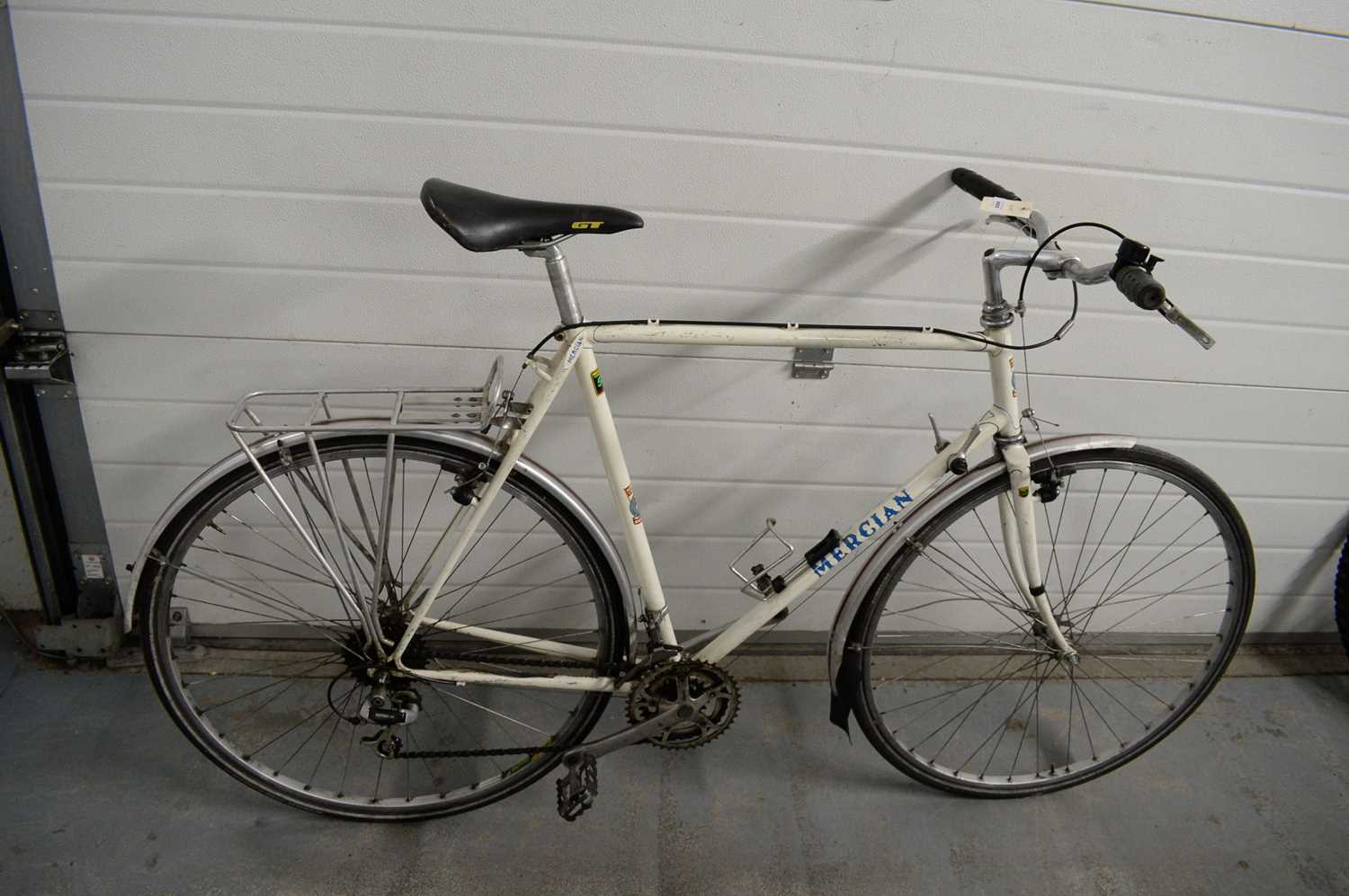 A flat-bar steel-framed bicycle by Mercian Cycles, Derby.