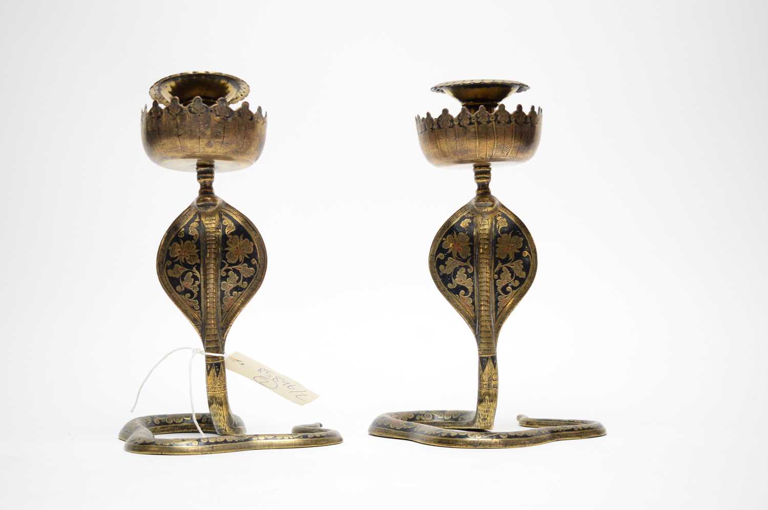 A pair of Eastern brass candlesticks. - Image 3 of 3