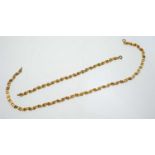 A matching 9ct yellow gold necklace and bracelet,