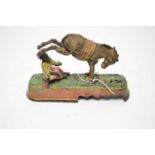 A late 19th Century ‘Always Did ‘Spise Mule’ cast iron monkey bank