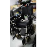 A Sedeo Puma 40 electric wheelchair, manufactured 2014.