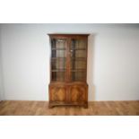 A 20th century Georgian-style mahogany glazed bookcase