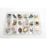A collection of pendants, brooches and fobs,