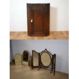 Two triptych toilet mirrors, and 18th Century oak corner cupboard