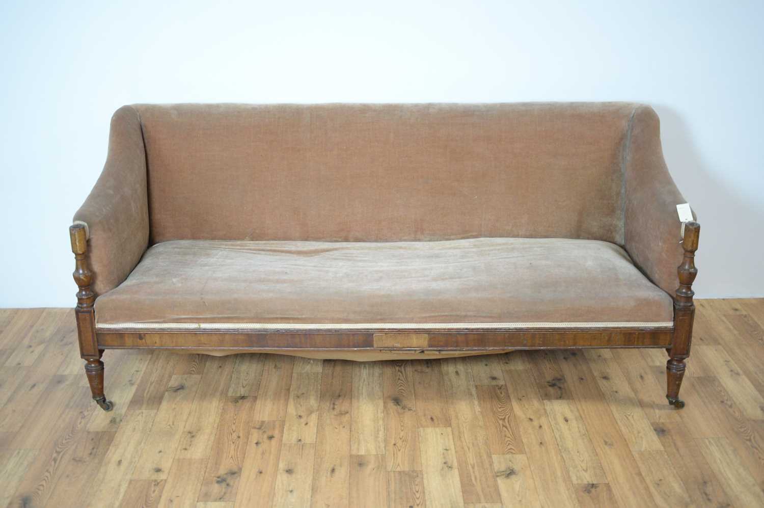 A 19th Century Victorian three person settle sofa