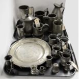 A selection of antique pewter wares, including: beer tankards; jugs; and other items.