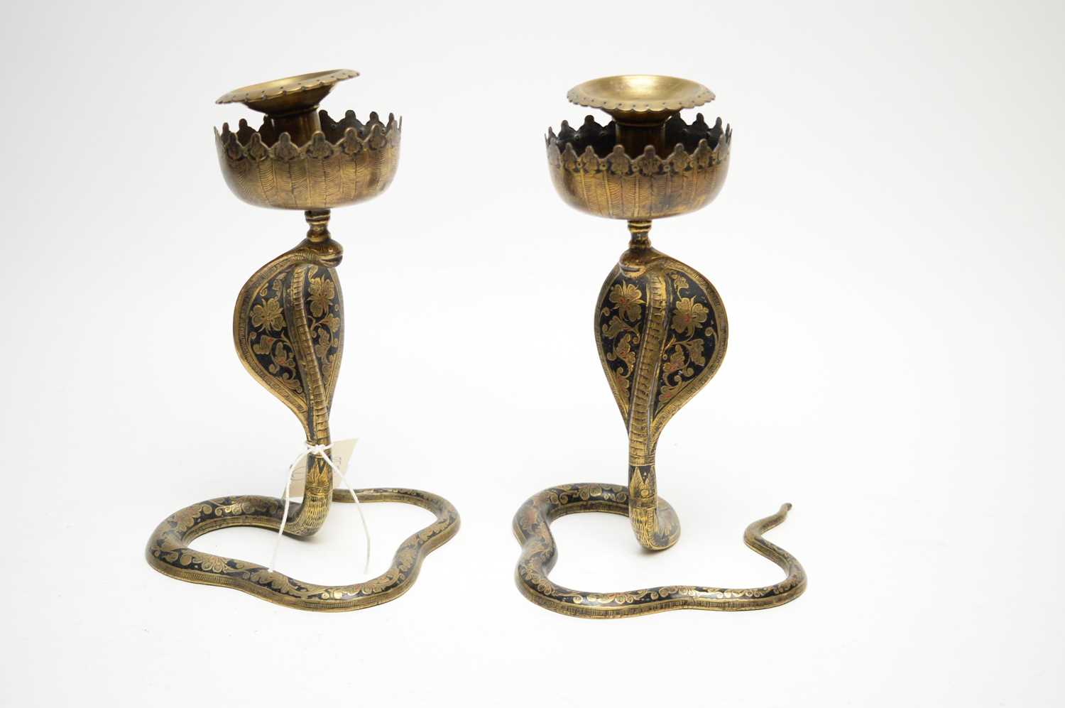 A pair of Eastern brass candlesticks. - Image 2 of 3