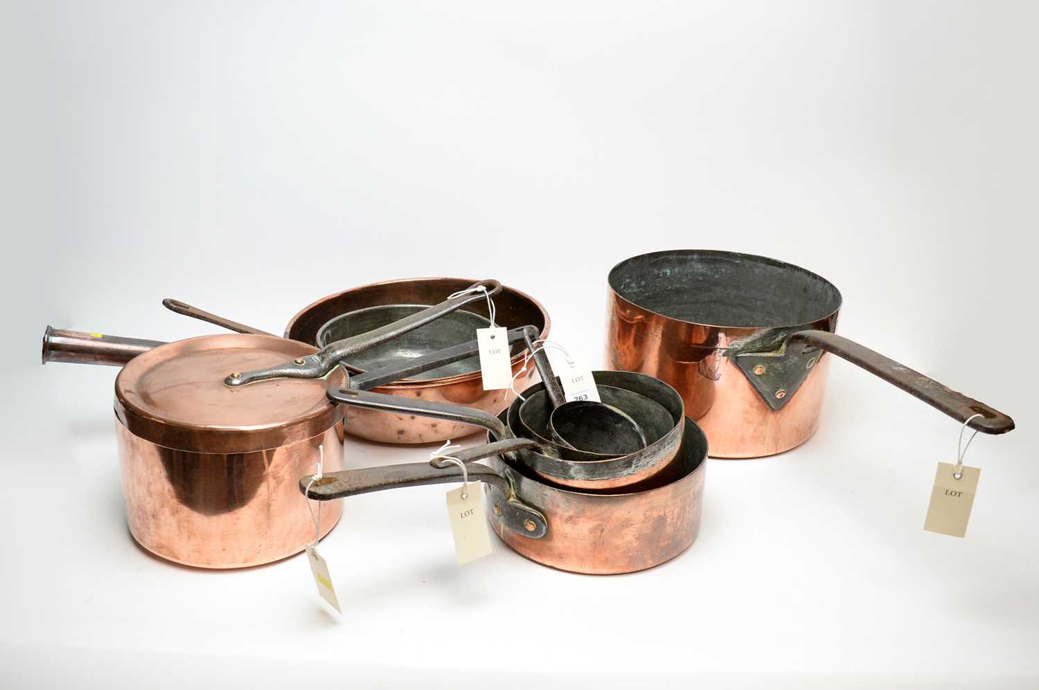 A selection of Victorian and later copper pans.