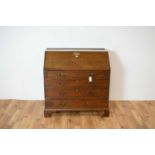 A 19th Century George III mahogany bureau