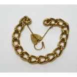 A 9ct yellow gold solid curb link bracelet,