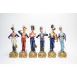 A collection of Capodimonte military figures.