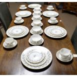 A Minton ‘Ashton’ pattern dinner and tea service, comprising six place settings.