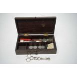 Antique rosewood box with contents (silver folk, sugar nips, 4 spoons and silver coins