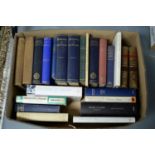A selection of hardback books, primarily memoirs and biographies, one box