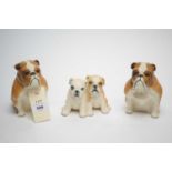 Two Royal Doulton limited edition bulldog figures; together with ‘The Bulldog Pups’ figure group