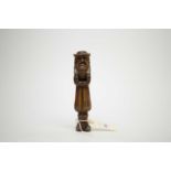 A Black Forest carved wood figural nutcracker.