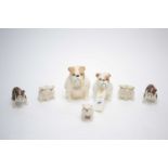 A collection of Beswick ceramic bulldog figures, each modelled seated.