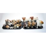 A collection of bulldog figures, including ceramic and resin examples