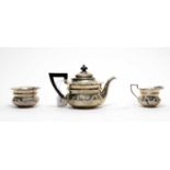 A silver bachelor's tea service, by Josiah Williams & Co,