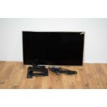 A Samsung 46 inch UE46D8000 Smart television with TV remote.