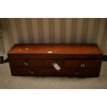 A 20th century mahogany desktop set of drawers.