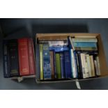 A selection of hardback books, primarily relating to ships and the navy, contained across two boxes.