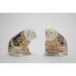 A pair of Royal Crown Derby bulldog paperweights.