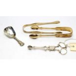 Silver tongs, nips and caddy spoon.