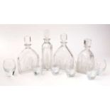 Orrefors glass decanters and contemporary goblets.