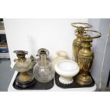 A brass oil lamp, together with a pair of brass oil lamps and a selection of other lamps.