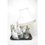 Two Lladro figures, Lladro table lamp and a Spanish decorative figure