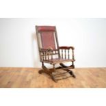 An early 20th Century aesthetic movement Boston Rocker armchair